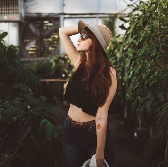 pretty woman yoga poses against bloating