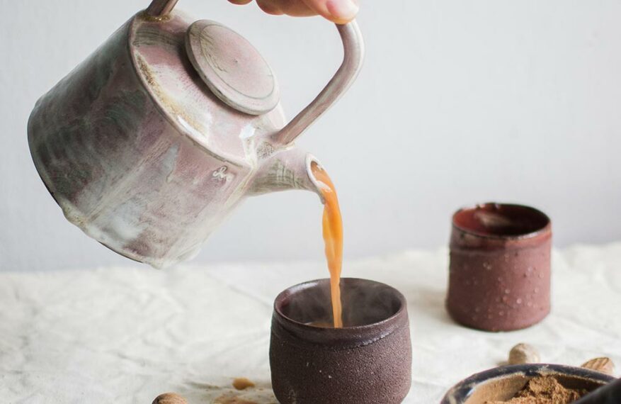 tea-pouring-from-pot-in-cup-yogi-tea-health-benefits