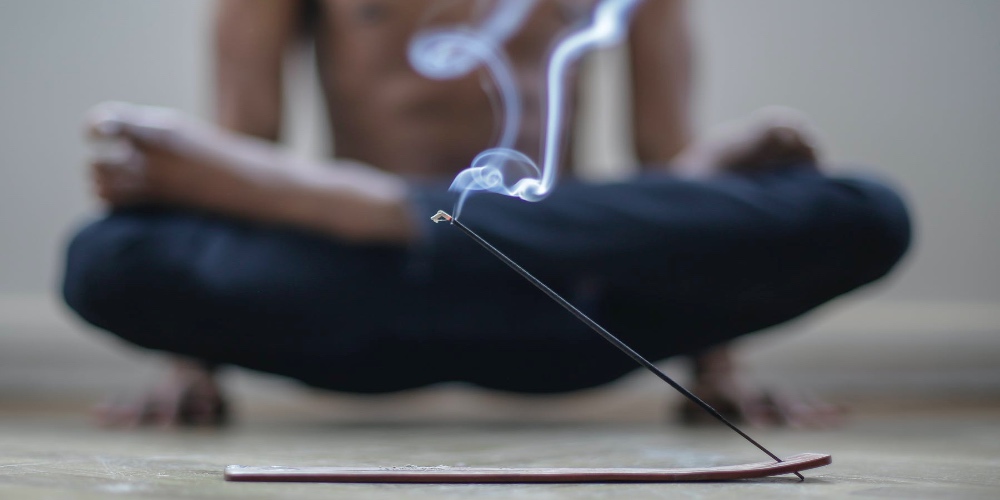 yoga pose with incense how to use incense